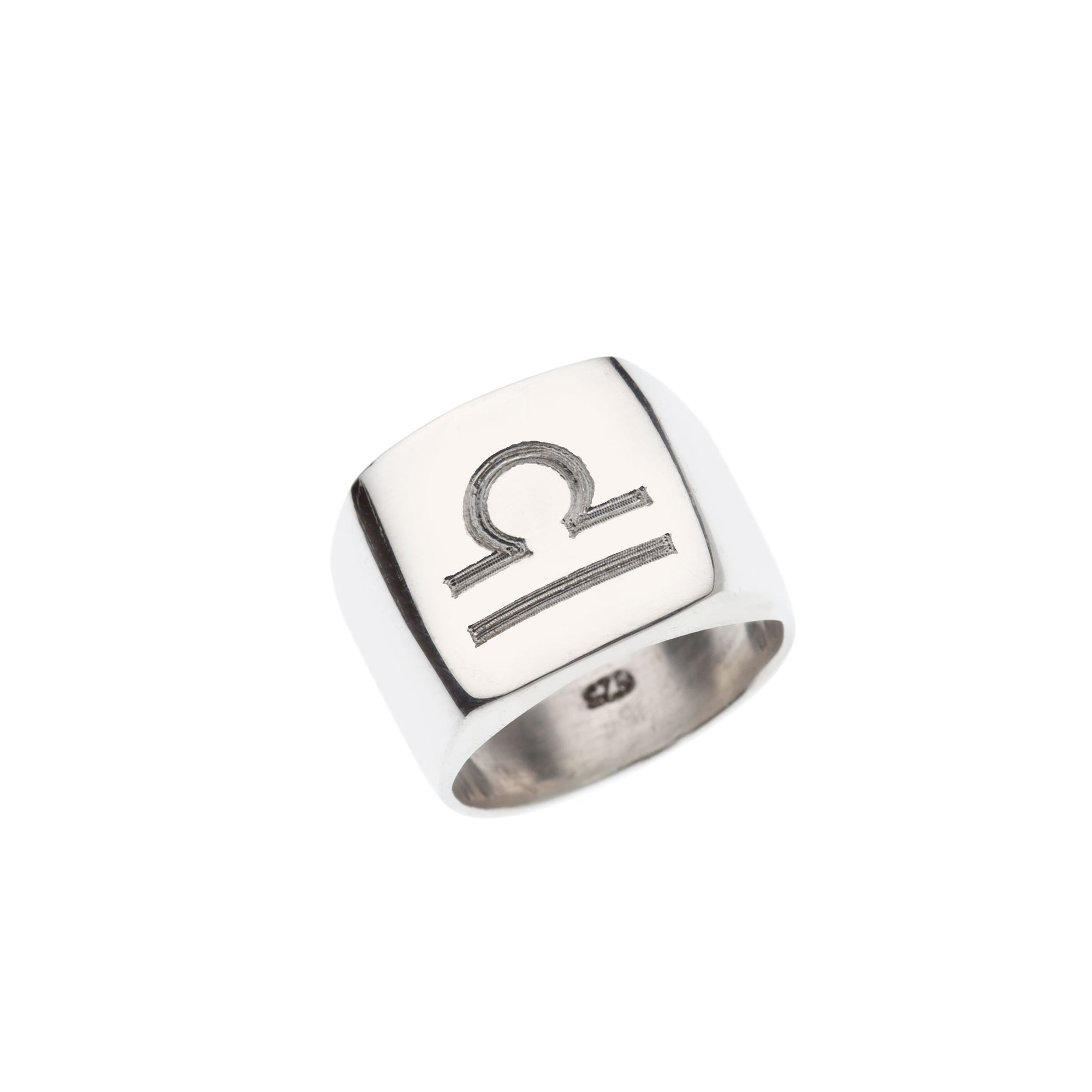 Square silver signet with engraved Libra symbol.
